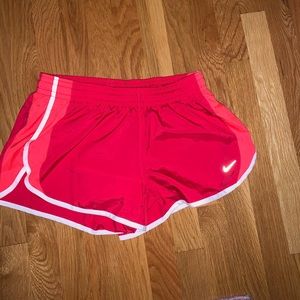 Red Nike shorts